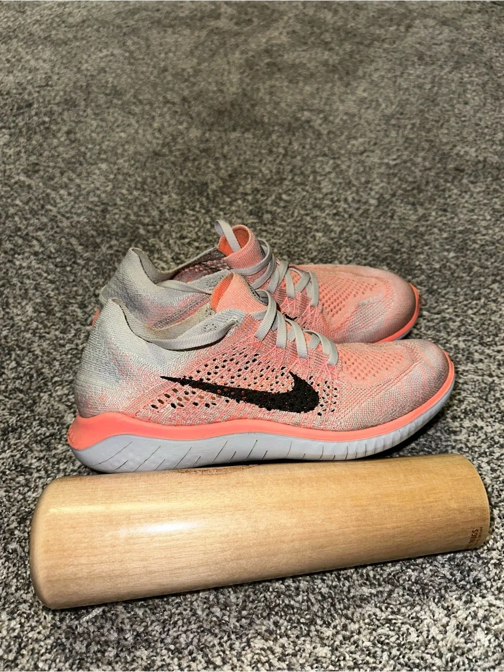 Nike Coral and Light Gray Flyknit Running Shoes with Black Swoosh